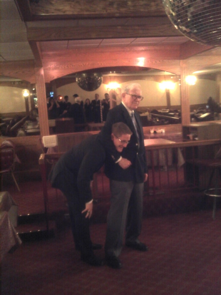Kyle with Warren Buffett at Texas A&M MBA talk in Omaha