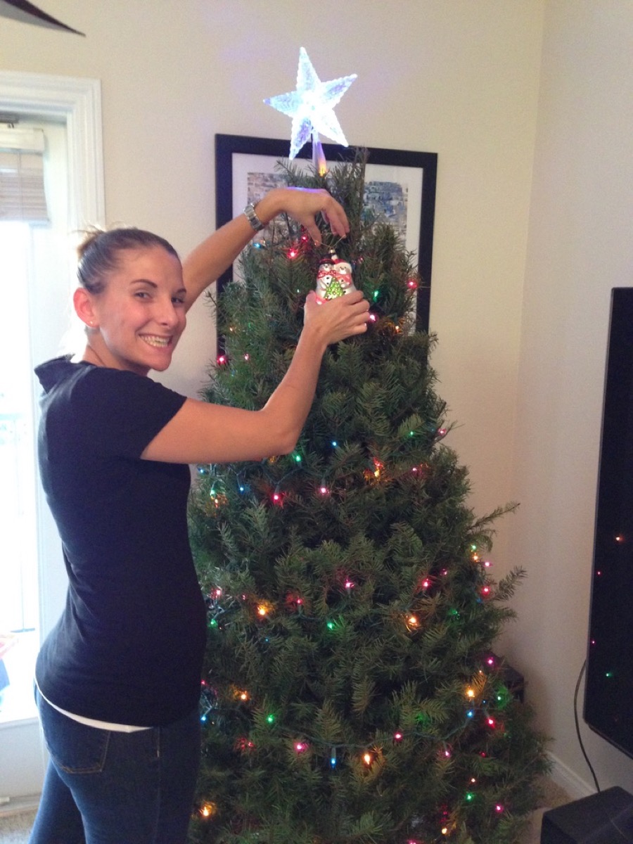 Kate decorating the Christmas tree