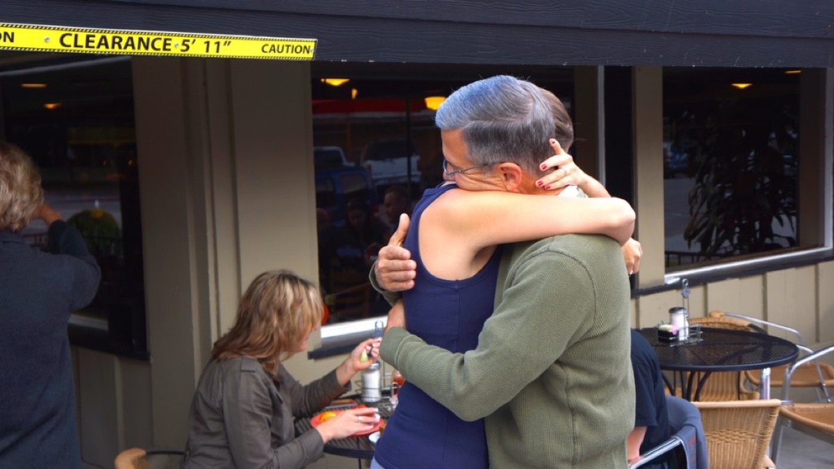 Kate hugging her dad Mark after the engagement