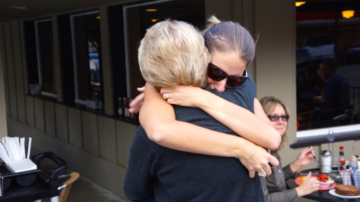 Kate hugging her mom after the engagement