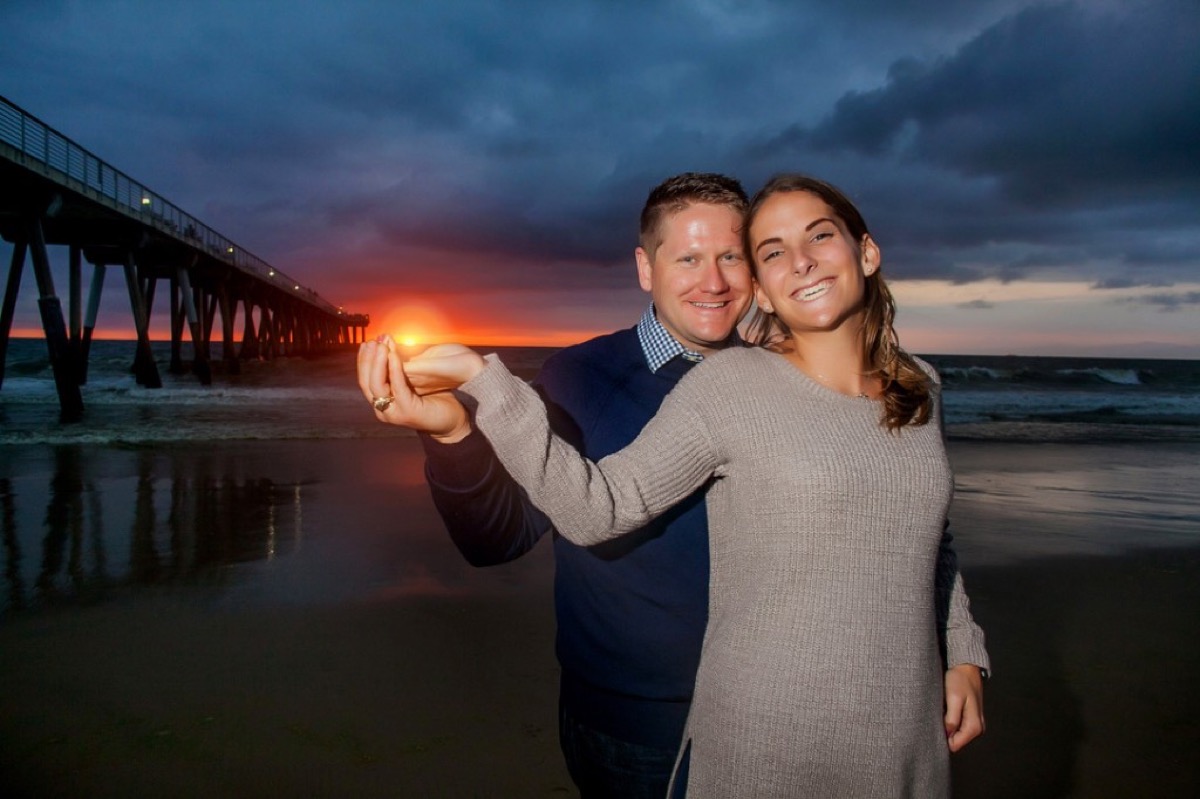 Kyle and Kate on Hermosa Beach pier at sunset