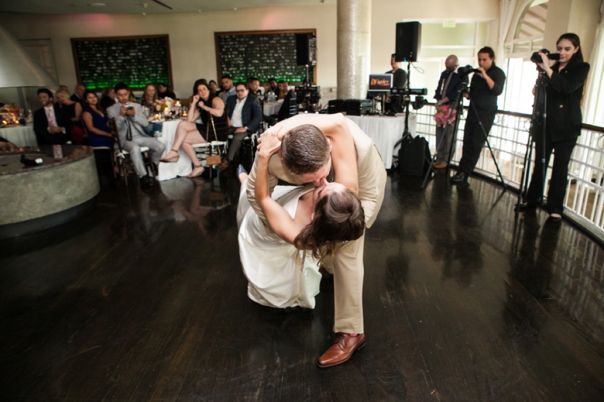 Kyle dipping Kate for a kiss during the first dance on the reception dance floor