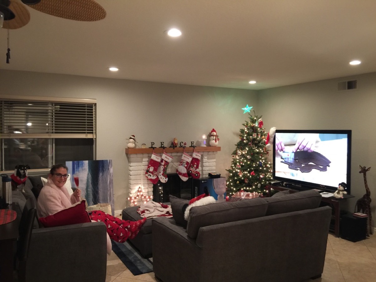Kate and Drifter by the Christmas tree in their new home