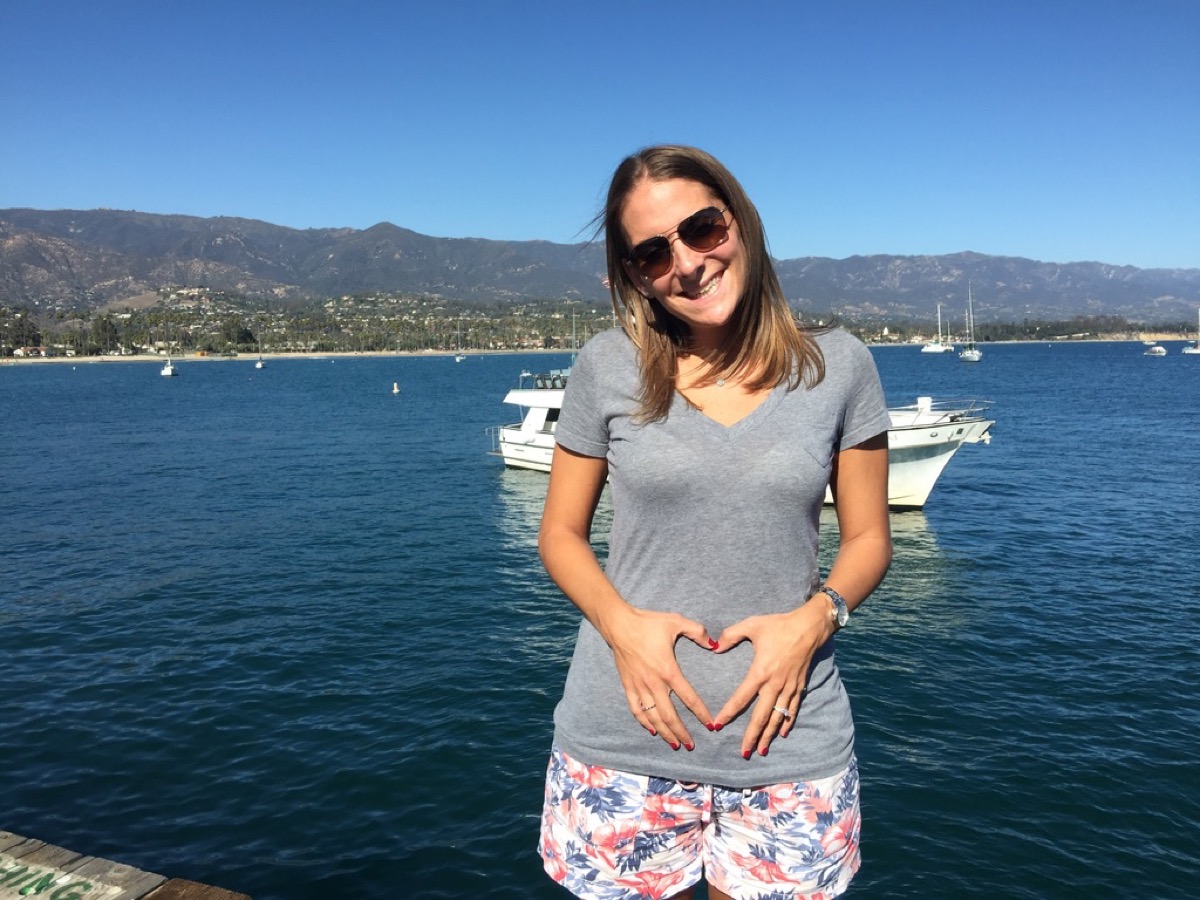 Kate making a heart over her tummy in Santa Barbara