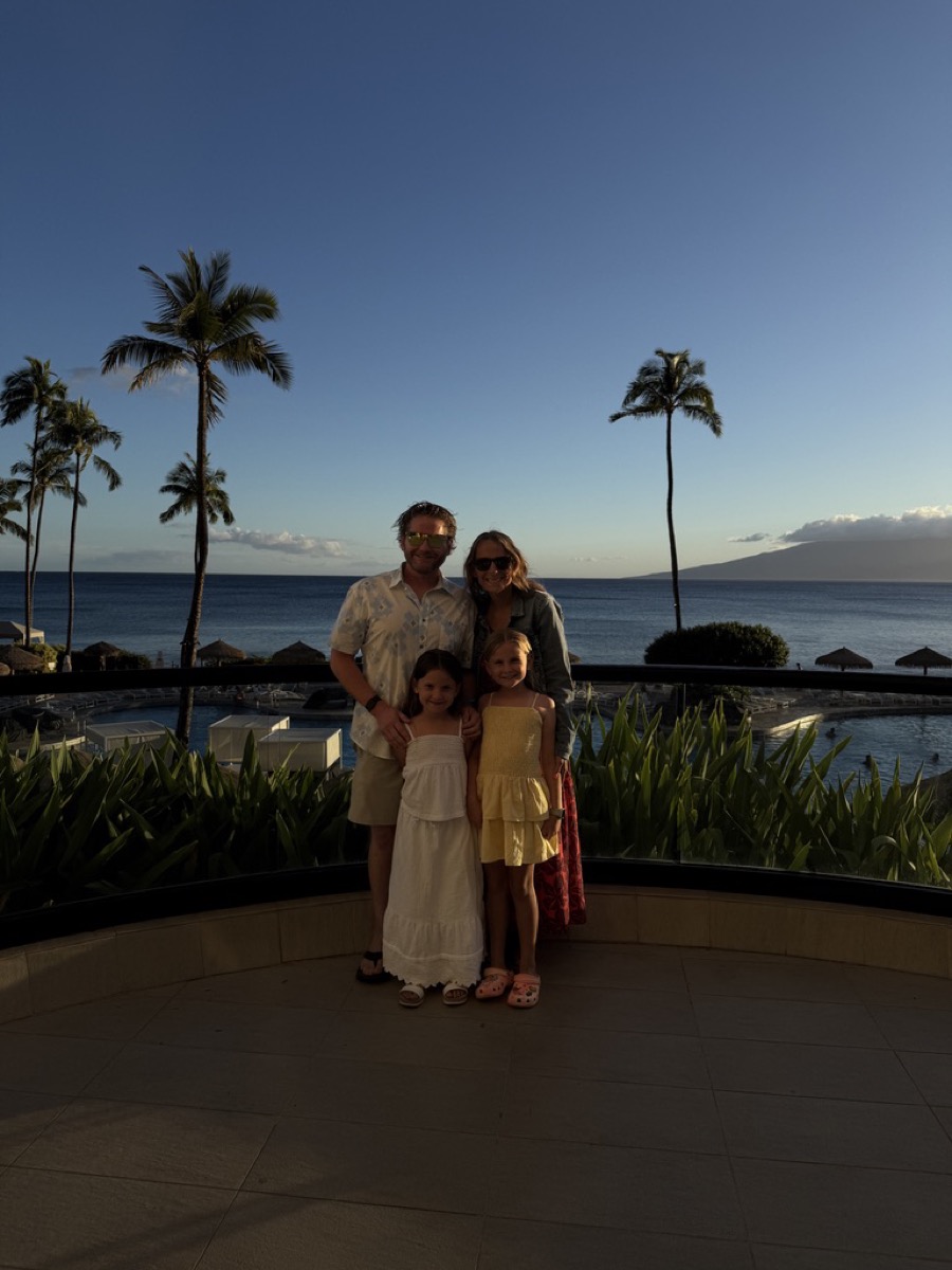 The Matthies family on a Maui resort balcony at sunset